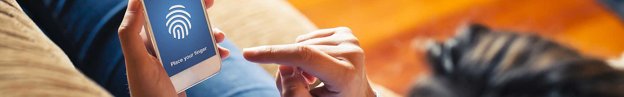 woman unlocking a cellphone with her fingerprint