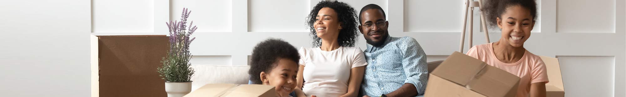 a family with moving boxes