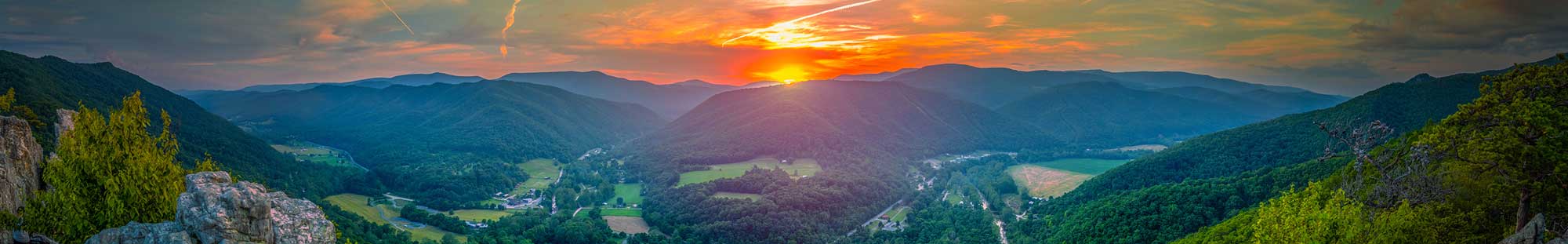 sun rising over West Virginia Mountains