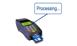 Card terminal showing inserted card and the word Processing